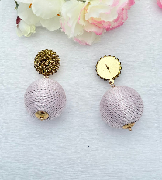 Statementohrringe in gold und rosa