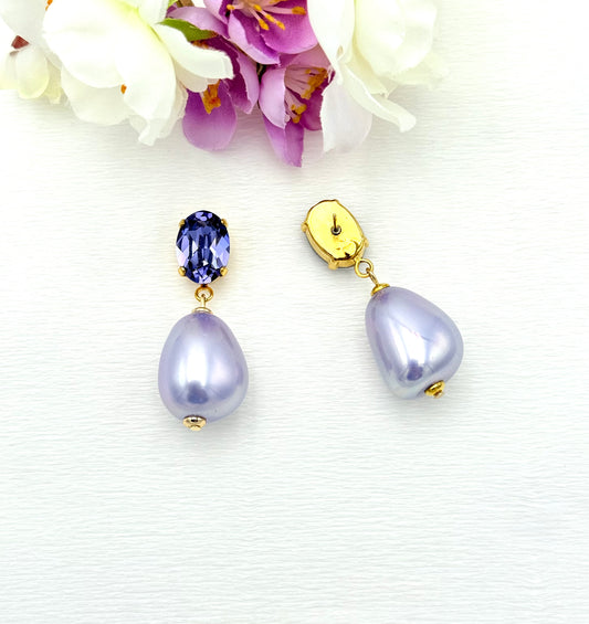 Funkelnder Stecker in Lila mit fliederfarbener Mallorcaperle