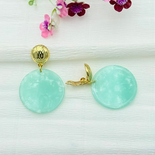 Goldfarbene Clips mit rundem Anhänger