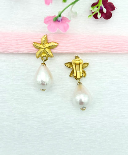Seestern-Clips in Gold mit leichtem Baumwoll-Tropfen