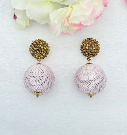 Statementohrringe in gold und rosa
