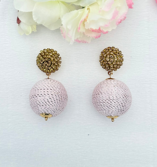 Statementohrringe in gold und rosa